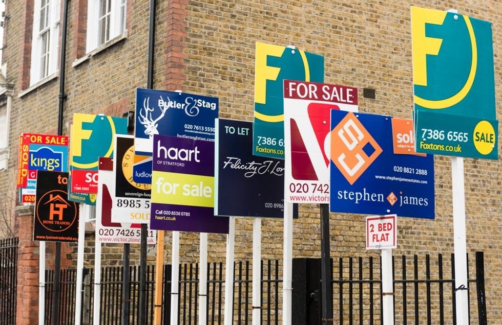 For sale signs outside property
