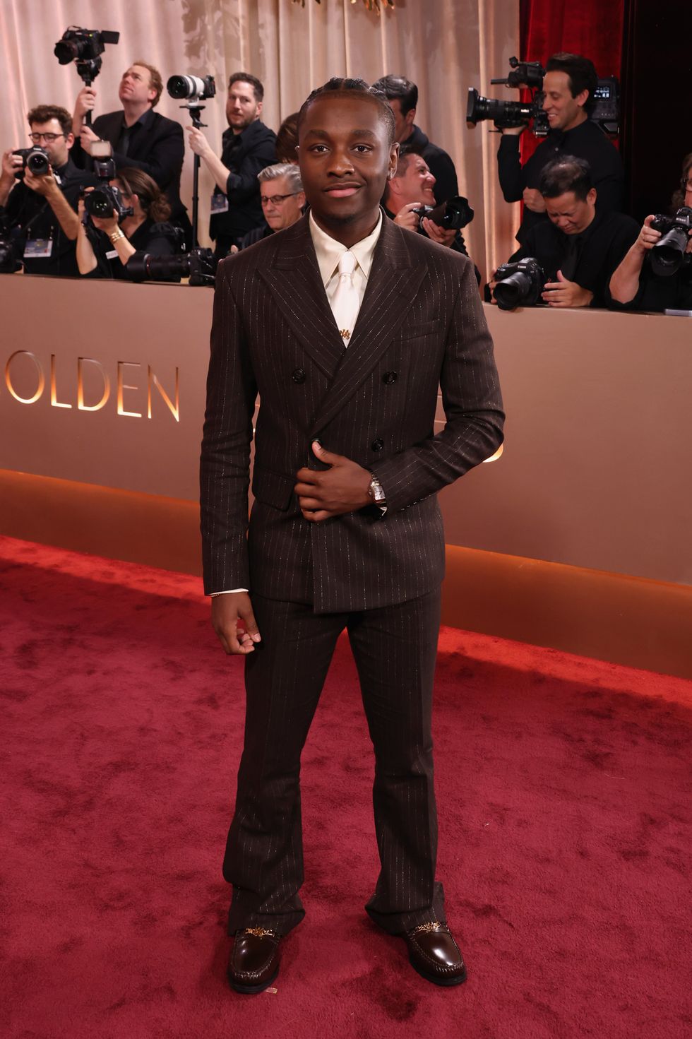 Golden Globes 2026 red carpet: Miles Caton from Sinners