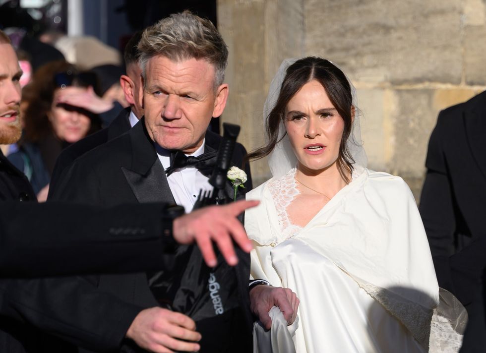 Gordon Ramsay walks with daughter Holly at her wedding to Adam Peaty