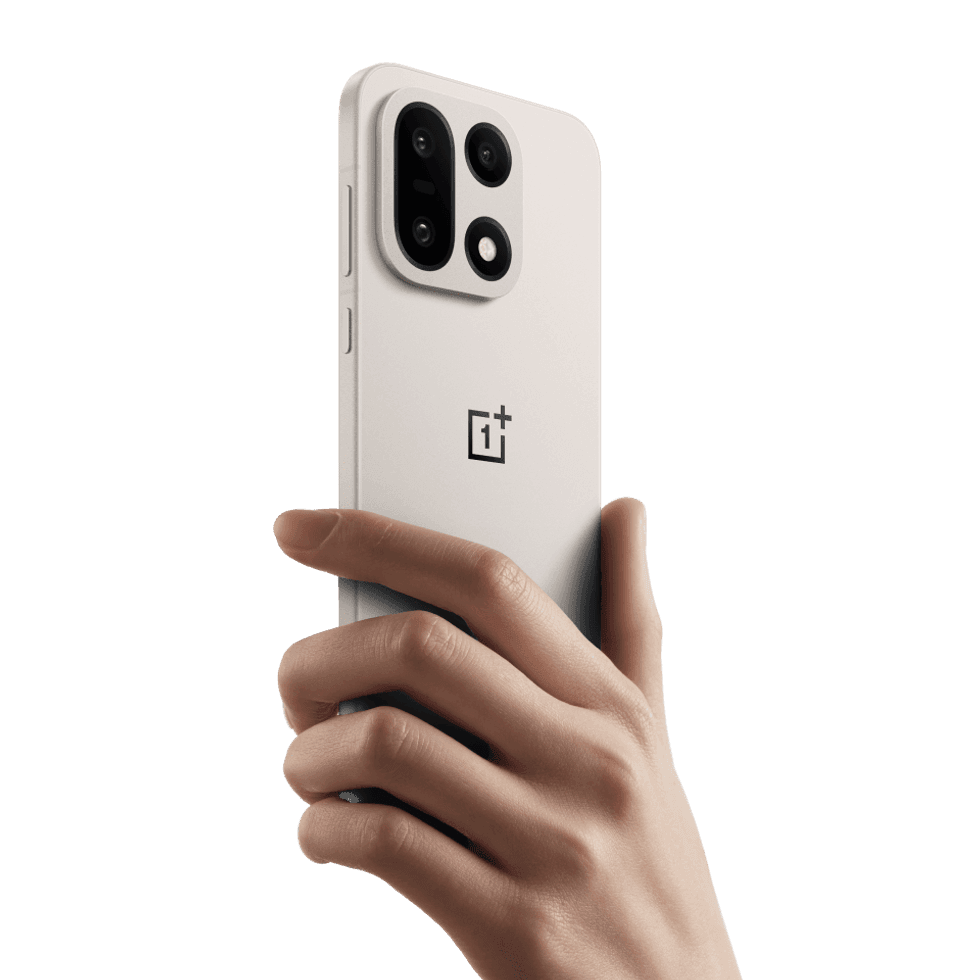 Hand holding the OnePlus 15