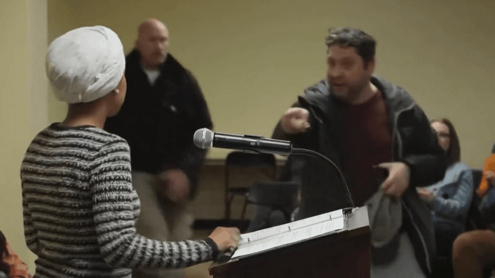 Ilhan Omar confronted at Minneapolis town hall