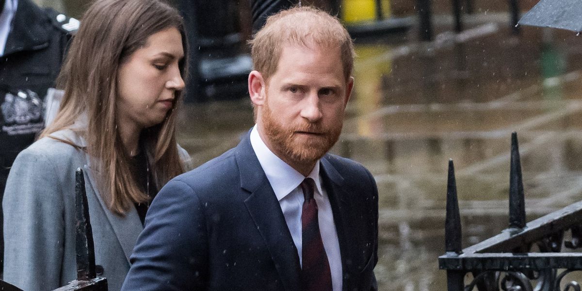 Prince Harry fights back tears as he accuses publisher of making Meghan Markle's life an 'absolute misery'