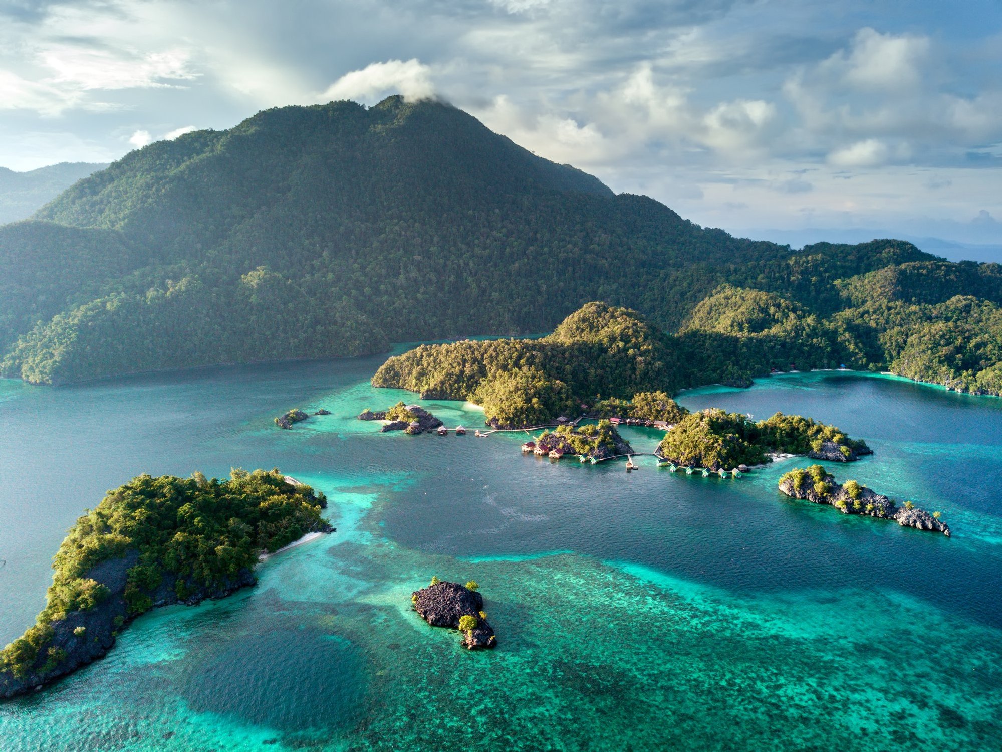 Eleven tourists rescued after 24 hours adrift as speedboat breaks apart off Indonesia