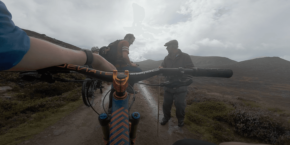 Bizarre moment cyclist bumps into King Charles on walk in Balmoral