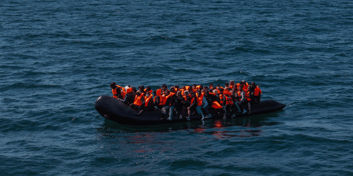 Mega-dinghy carrying dozens of illegal migrants catches fire while crossing Channel