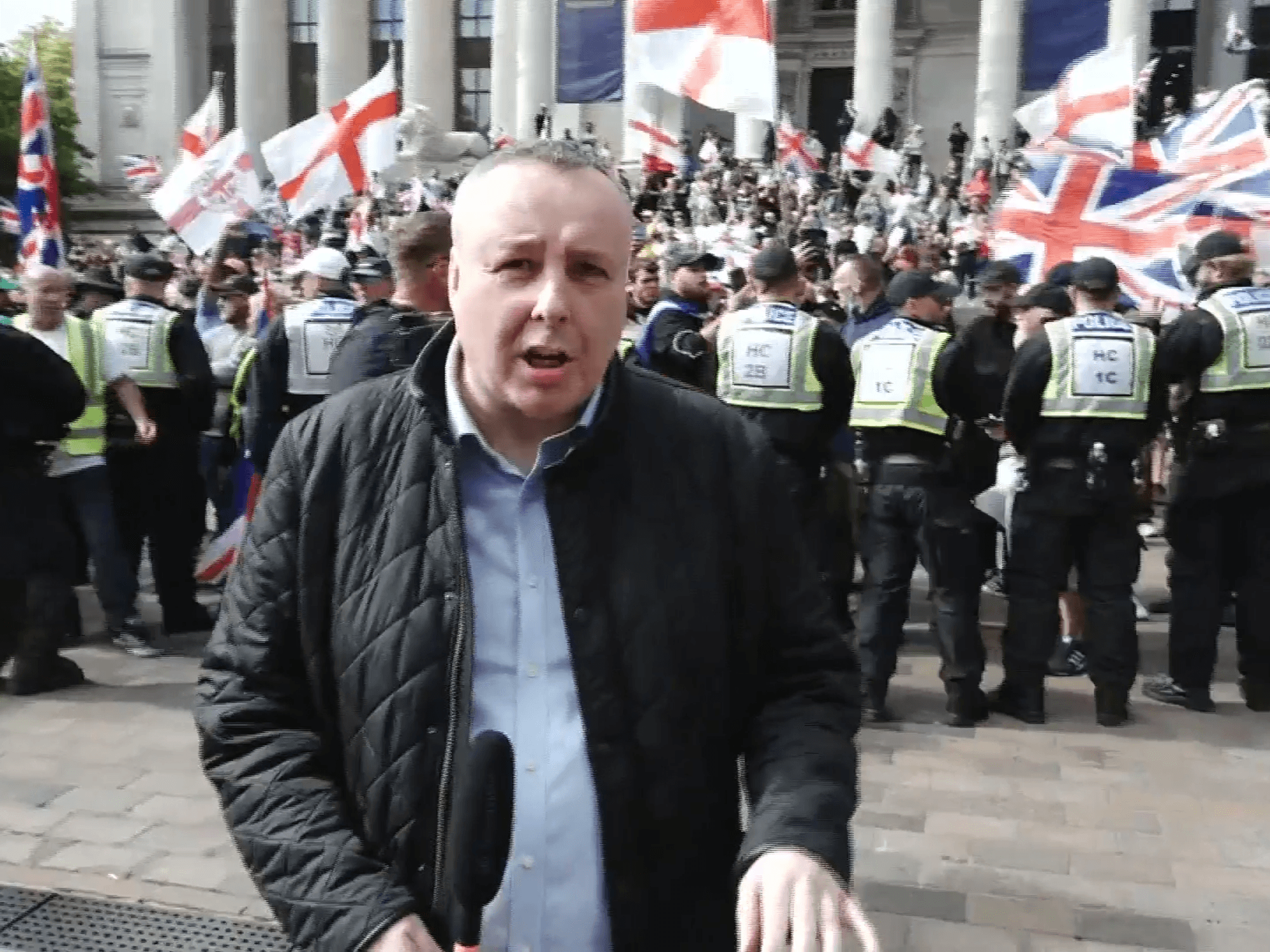 Mark White baffled as police march counter-protesters to face off with anti-migrant demonstrators...