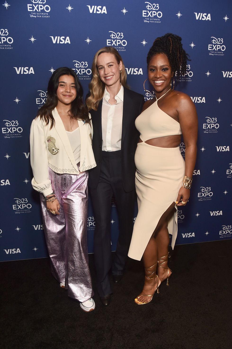 Iman Vellani, Brie Larson, and Teyonah Parris attend D23 Expo 2022