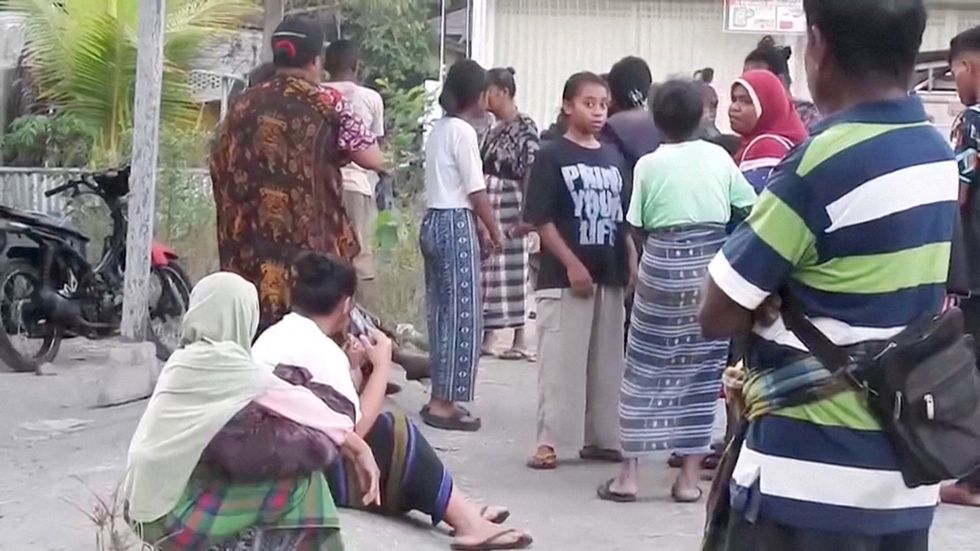Indonesian villagers after earthquake