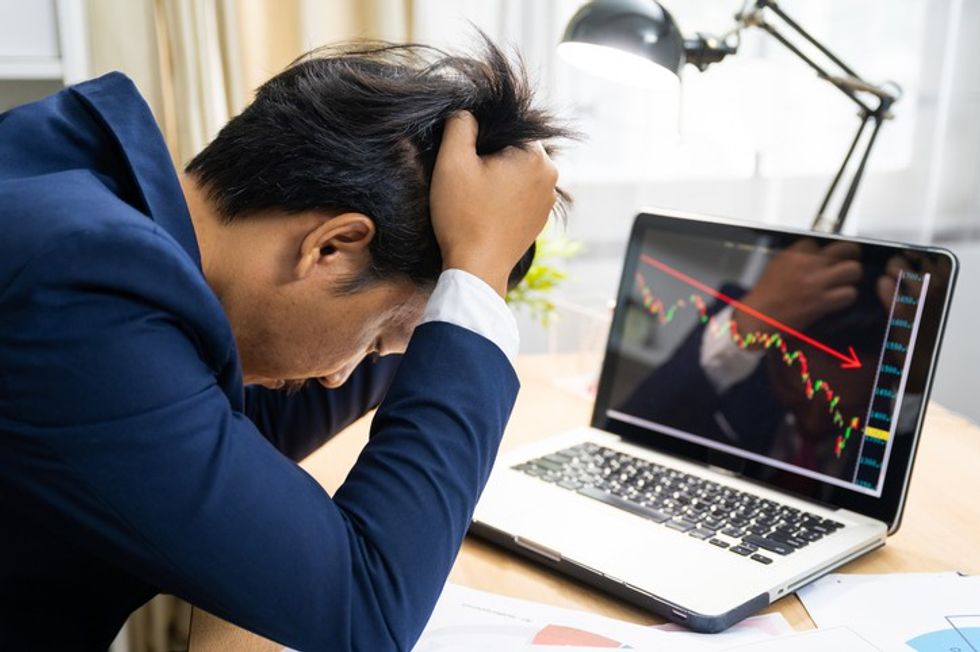 Investor at laptop