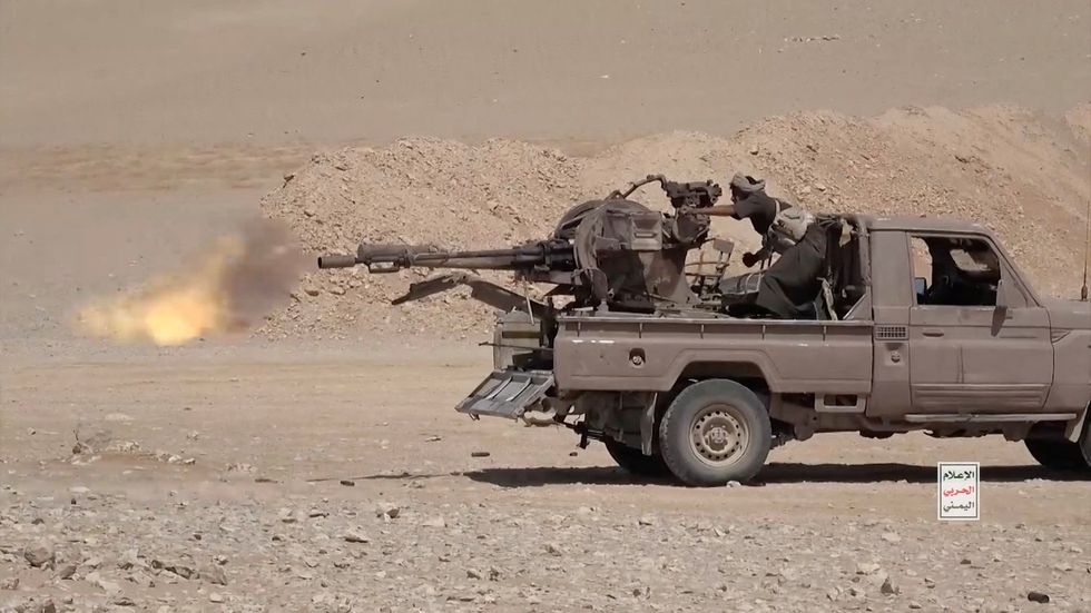 Iran-aligned Houthi fighter fires gun from \u200bpickup truck
