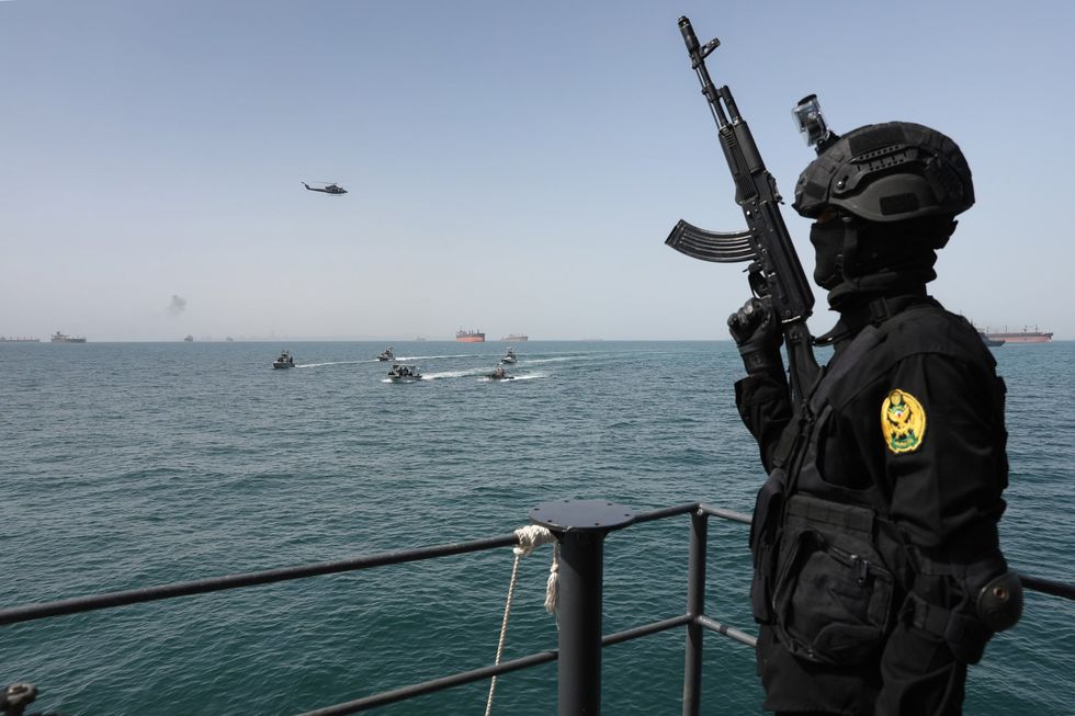 Iranain soldier in the Strait of Hormuz