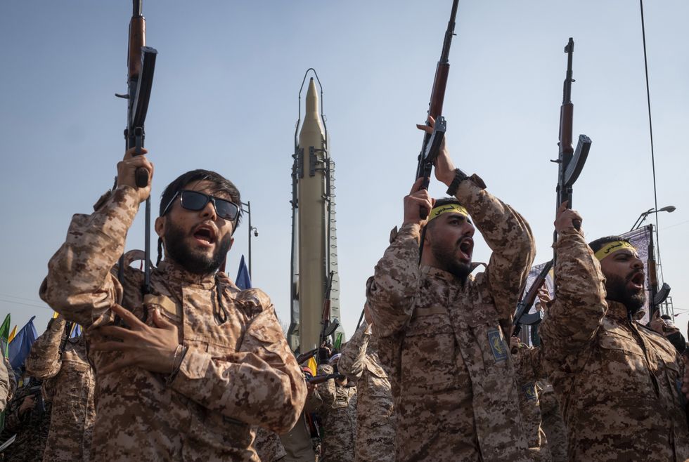 IRGC troops parade with ballistic missile