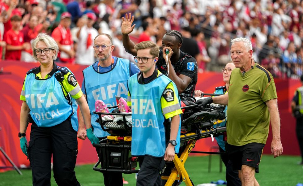 Ismael Kone gestures to fans while leaving the pitch in Canada's win over Qatar