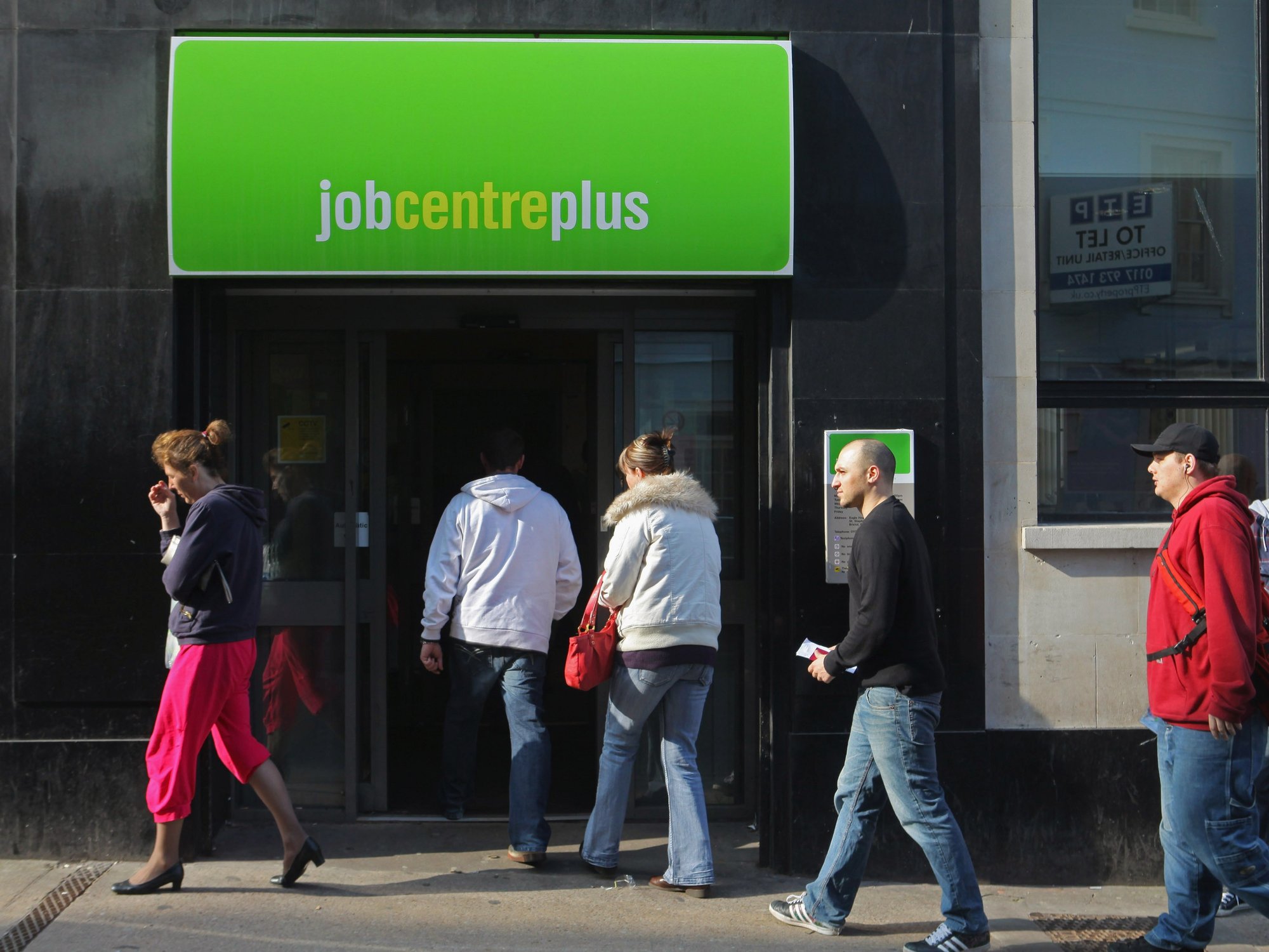 Job seekers enter job centre