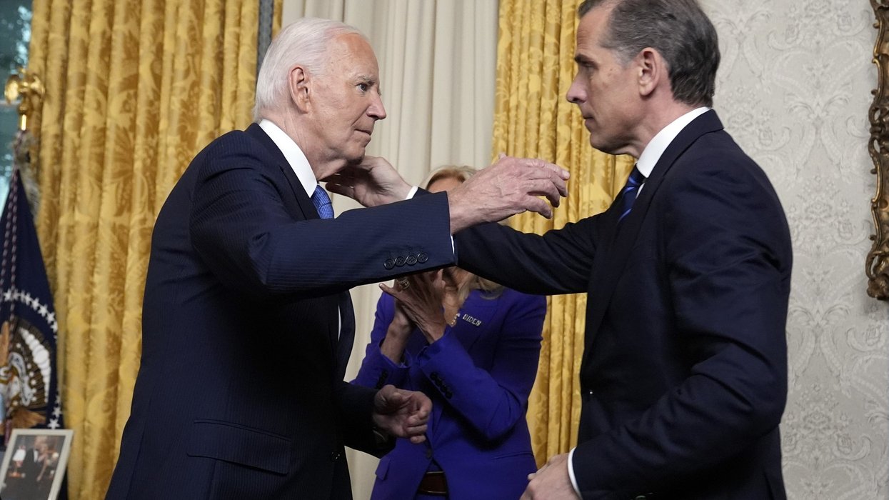 Joe and Hunter Biden going in for a hug