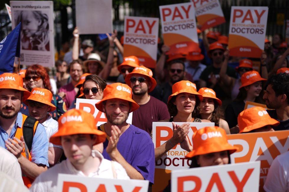 Junior doctors protesting pay outside Downing St in June 2024