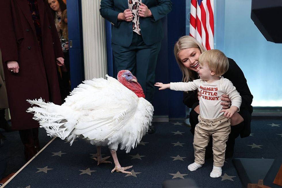 Karoline Leavitt with her son, Niko, during the annual Turkey pardon