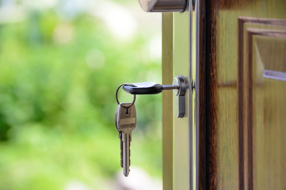 Keys in door at house