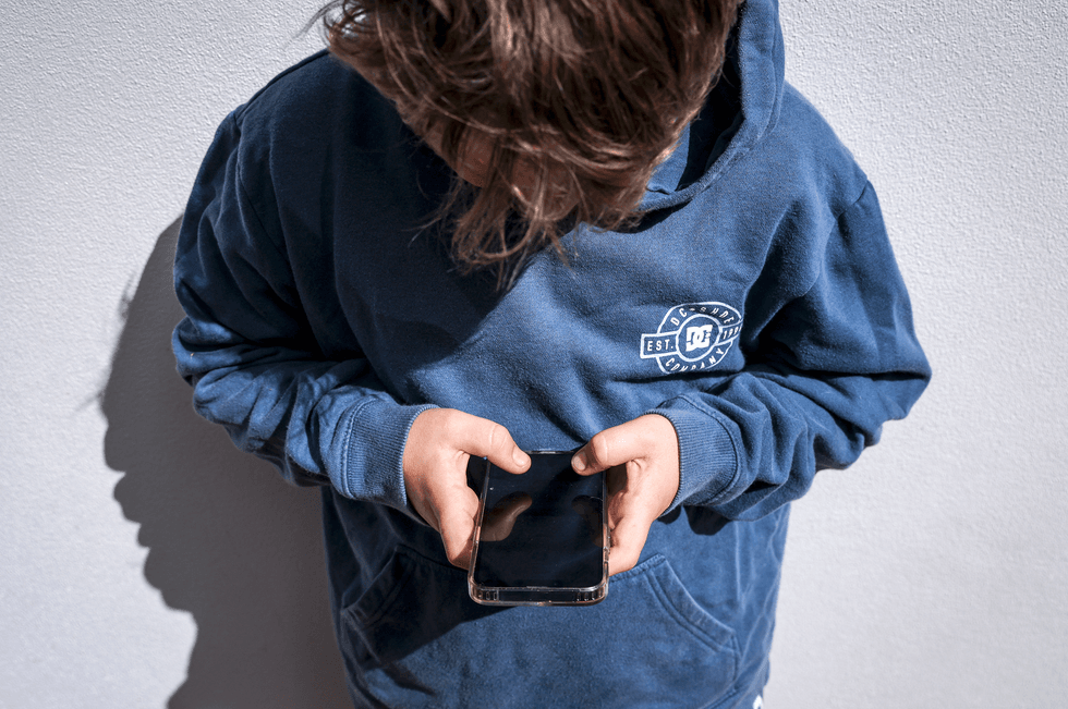 Kid on the phone