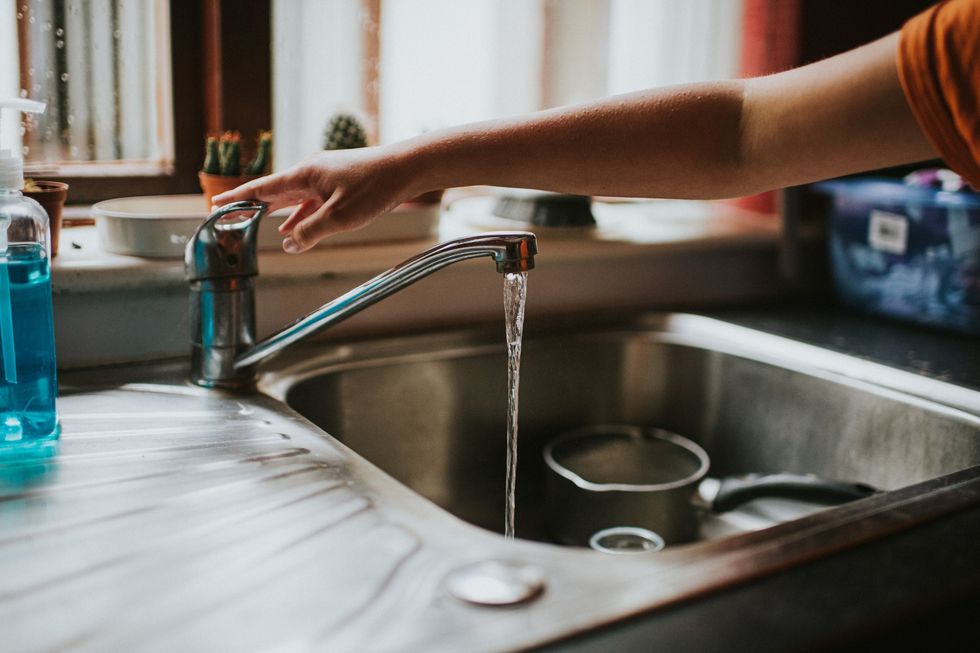 Kitchen tap running