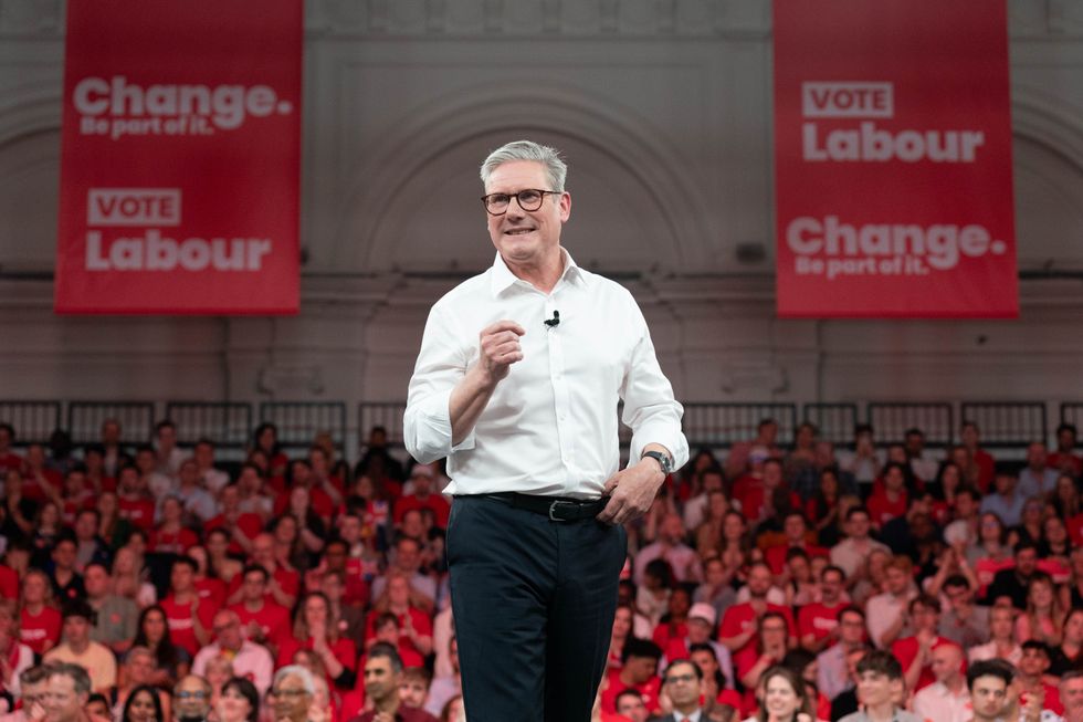 Labour leader Sir Keir Starmer addresses an audience of Labour Party members and supporters during a rally at the Royal Horticultural Halls in central London