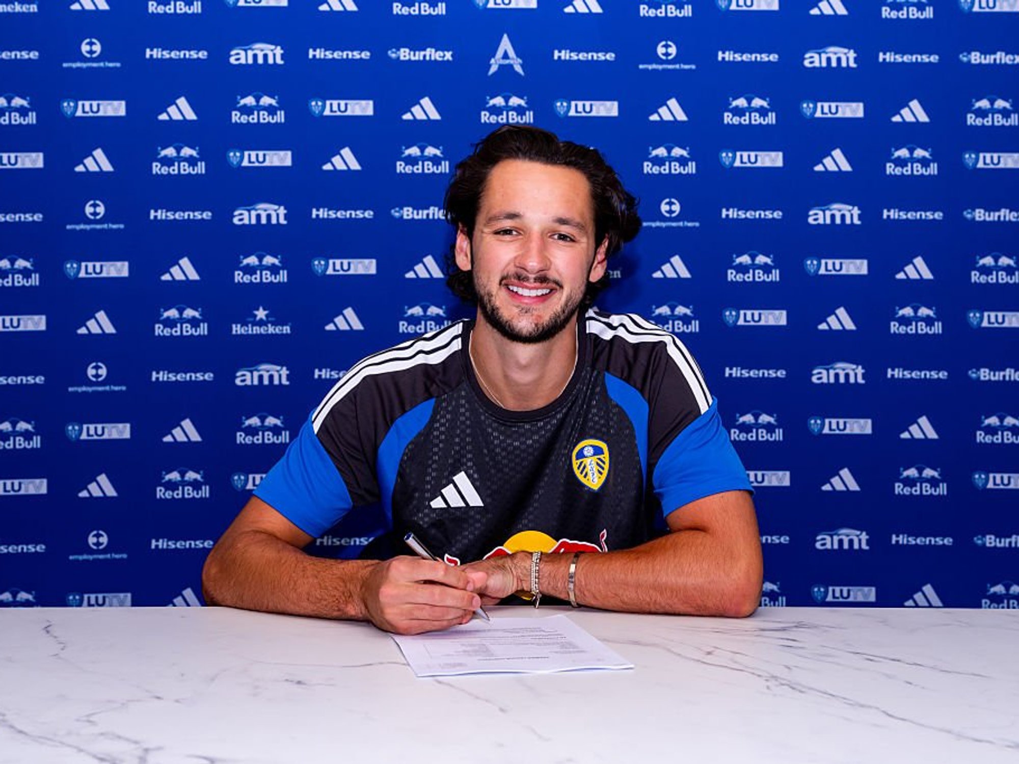 Leeds United have completed the signing of James Trafford