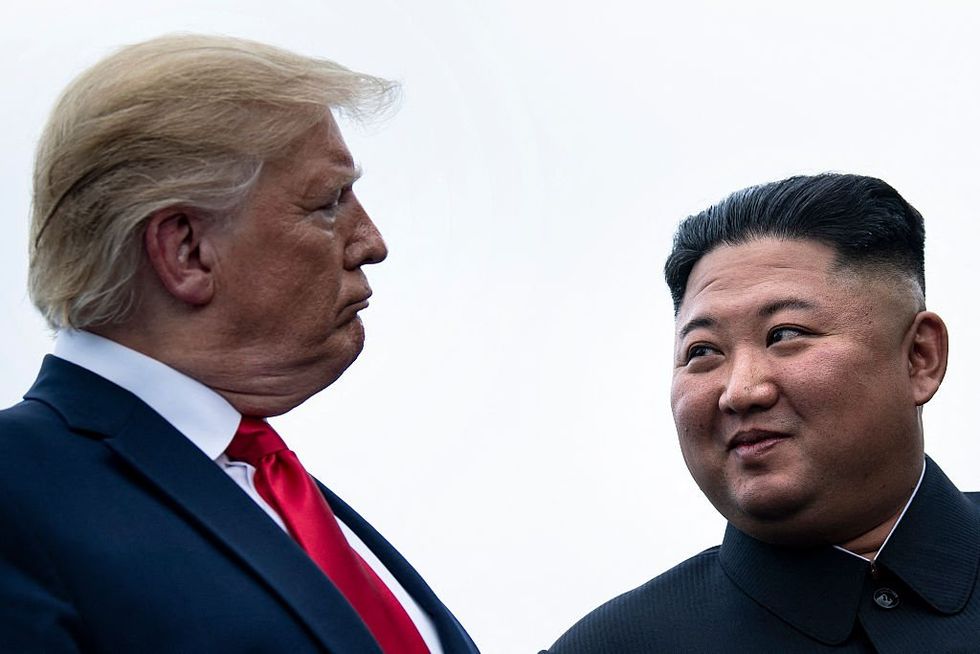 (left to right) Donald Trump and Kim Jong-un