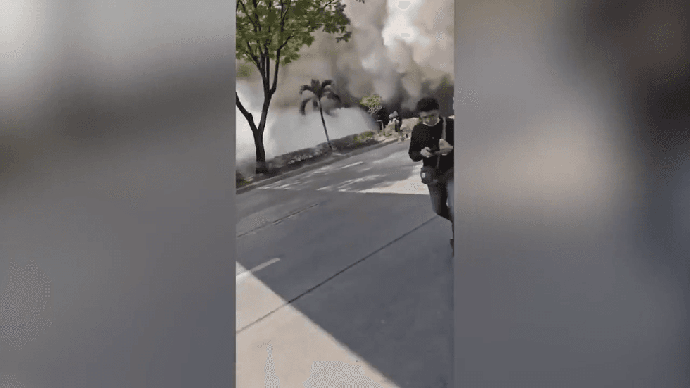 Locals flee the scene