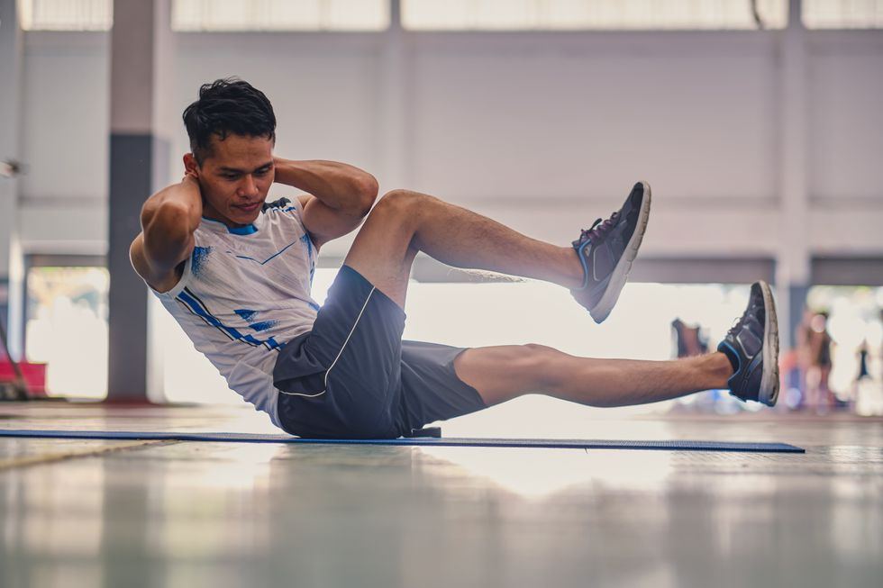 Man doing bicycle crunches