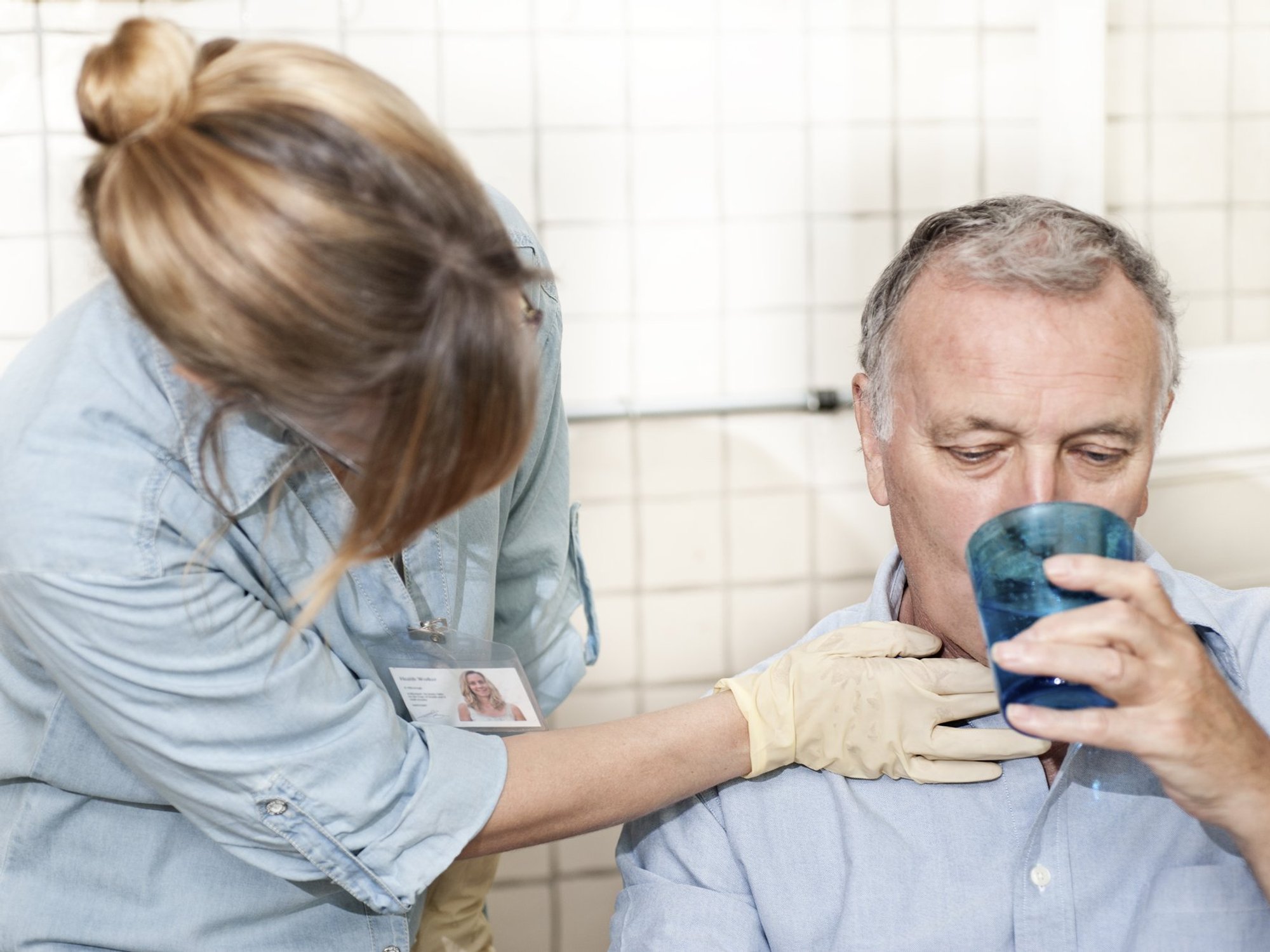 man drinking water