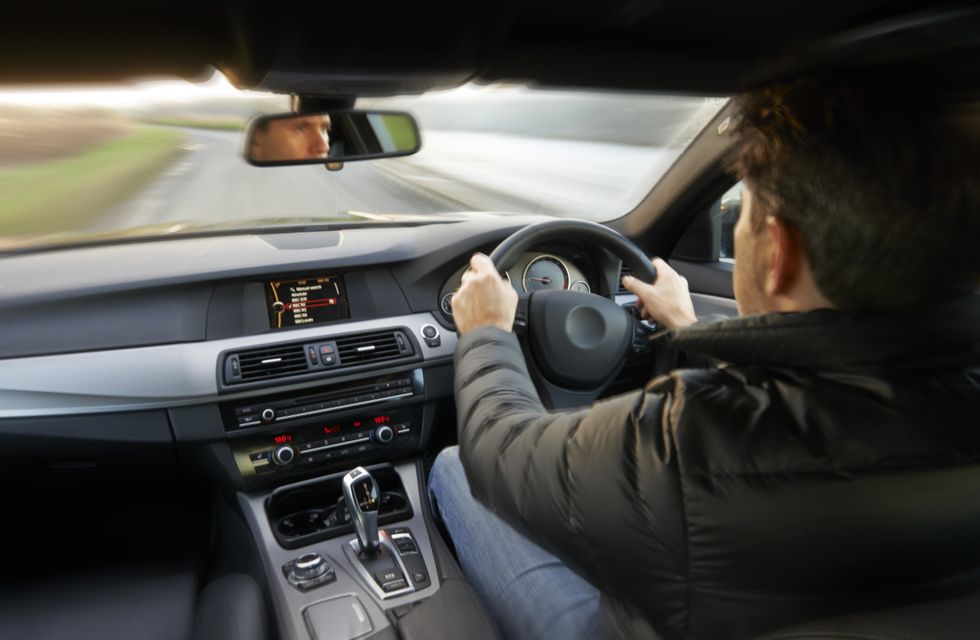 Man driving a car
