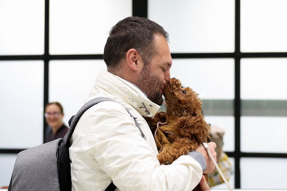 Man reunited with dog after being stranded in Dubai