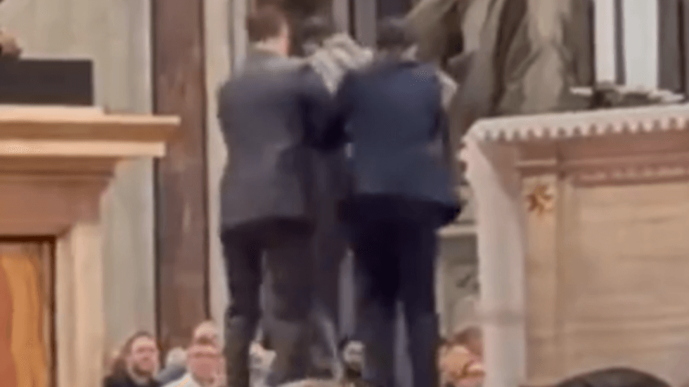 Man urinating at St Peter's Basilica dragged away