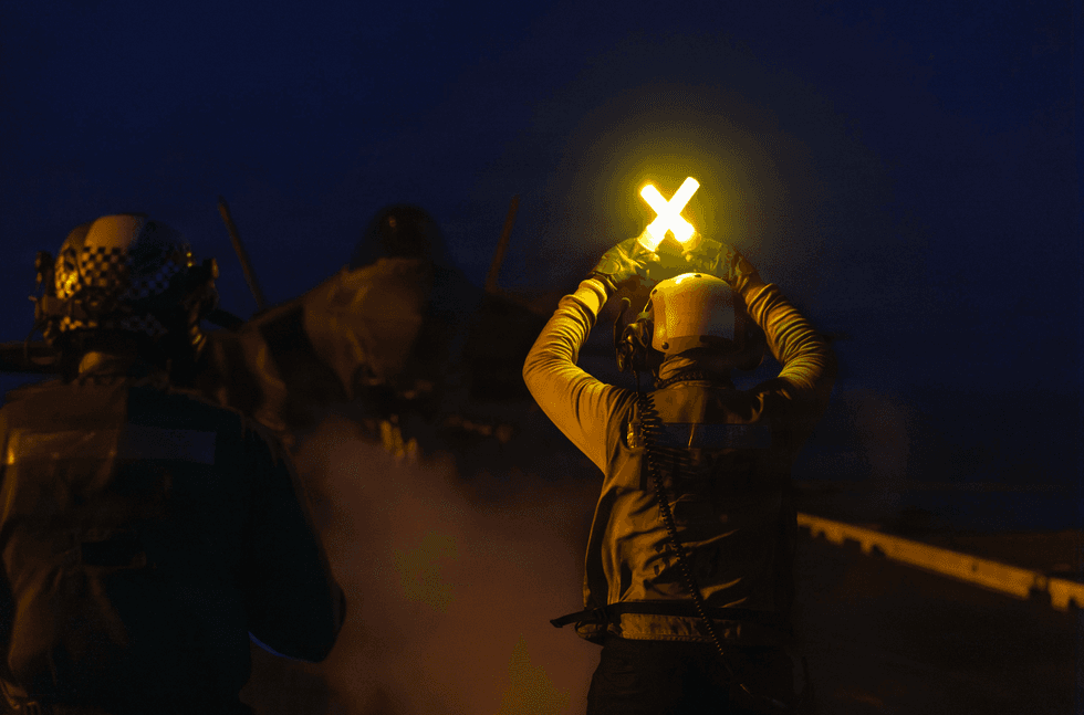 Marine Fighter Attack Squadron (VMFA) 314, prepares to launch from the flight deck of the Nimitz-class aircraft carrier USS Abraham Lincoln (CVN 72) in support of Operation Epic Fury on March 2, 2026 at sea
