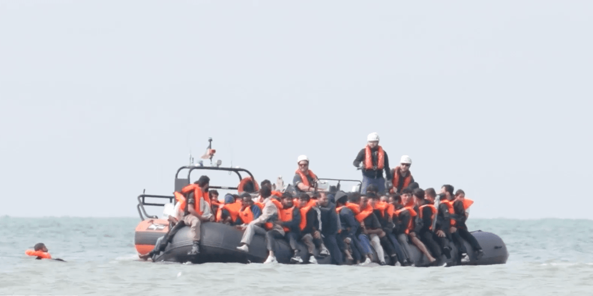 Mega dinghy carrying RECORD number of illegal migrants reaches Britain as 230 cross Channel