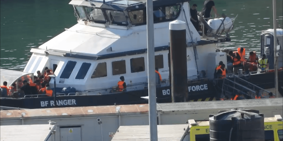 People smugglers launch 'full-frontal assault' across miles of French coast as 700 migrants attempt Channel crossing