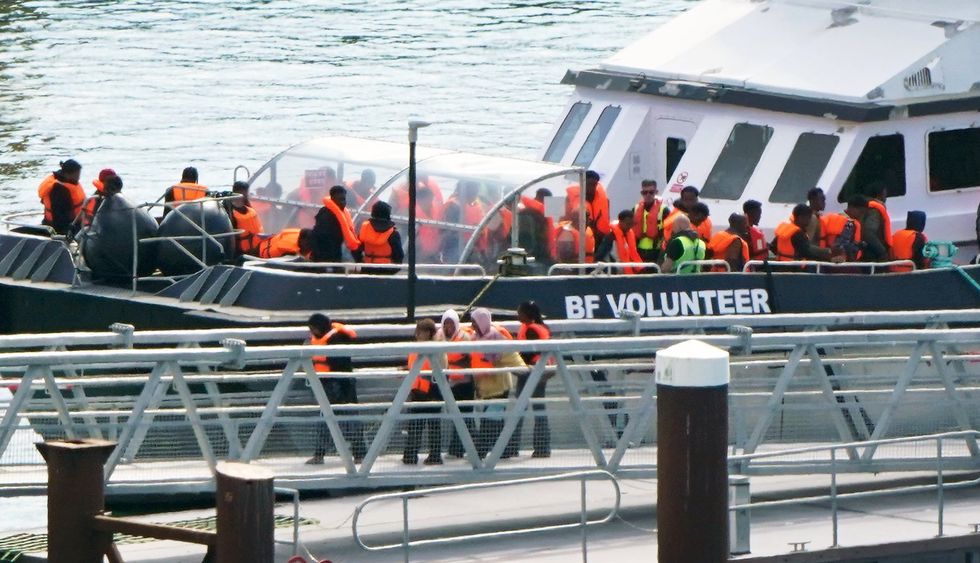 Migrant dinghy passengers arriving in Dover on Friday