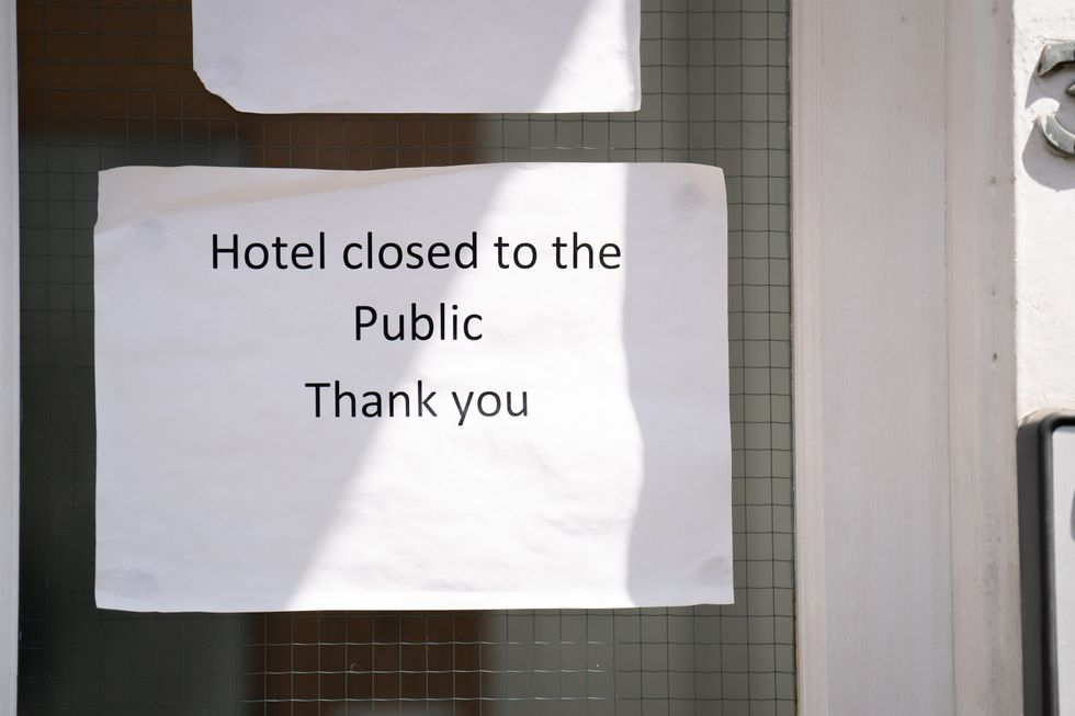 Migrant hotel sign
