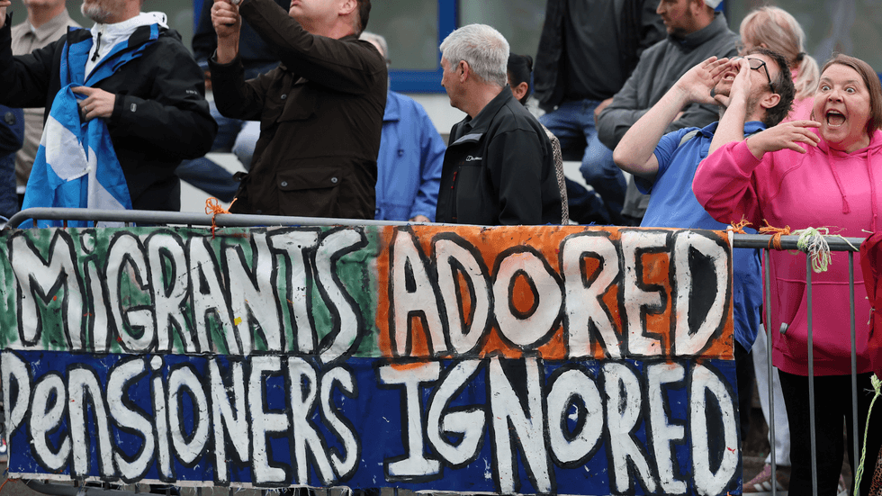 'Migrants adored, pensioners ignored' poster