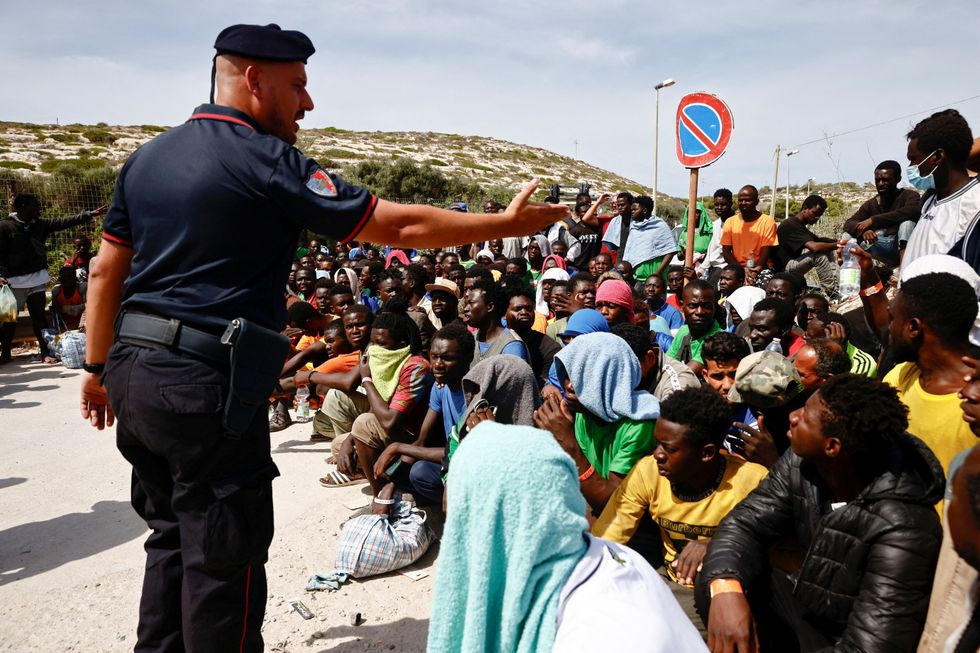 Migrants being sorted on Lampedusa