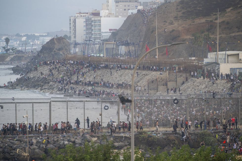 Migrants breakin into Ceuta