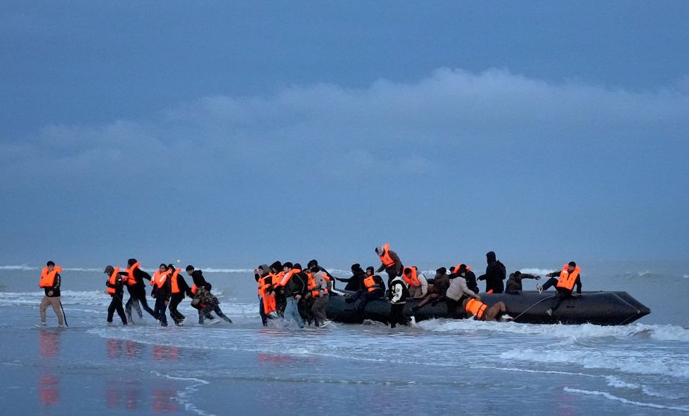 Migrants in a small boat
