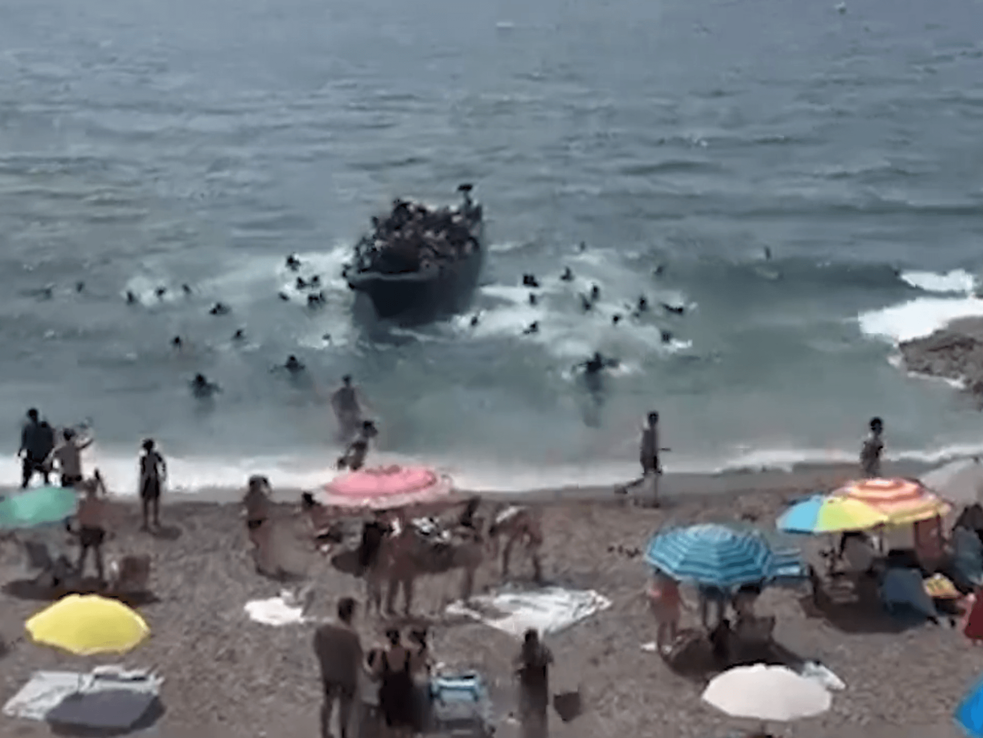 Migrants land on beach in La Manga, Spain