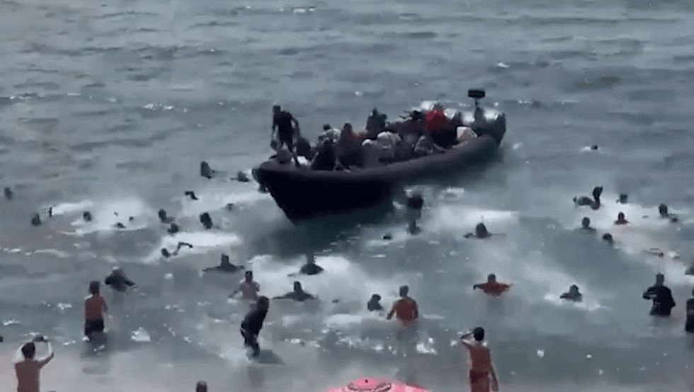 Migrants land on beach in La Manga, Spain
