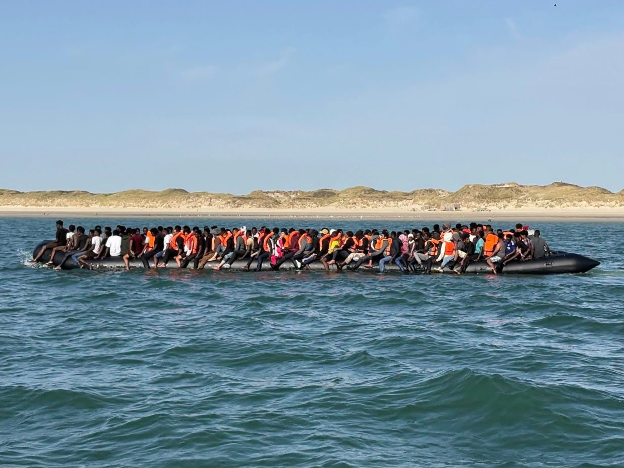 Migrants on a mega-dinghy in the English Channel