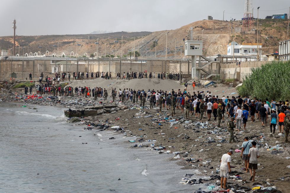 Migrants pouring into Ceuta