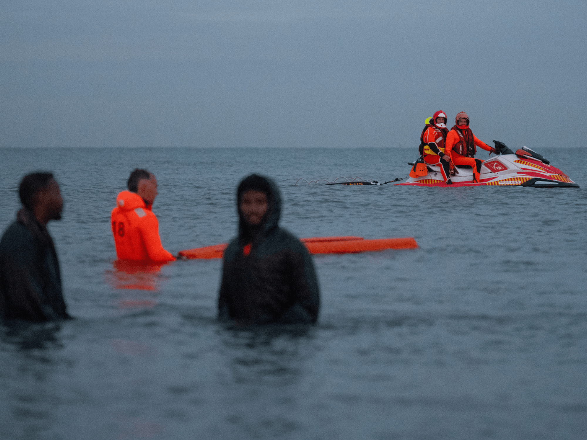 Migrants were rescued by a jetski being deployed off the coast south of Calais