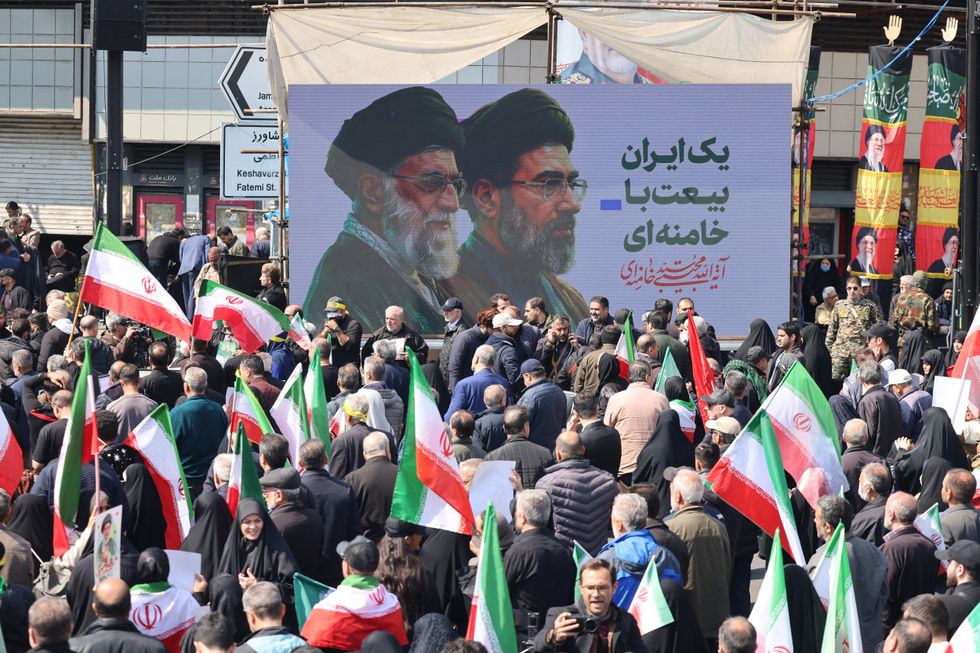 Mojtaba Khamenei and Ali Khamenei billboard