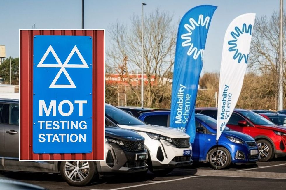 MOT test sign and a Motability forecourt