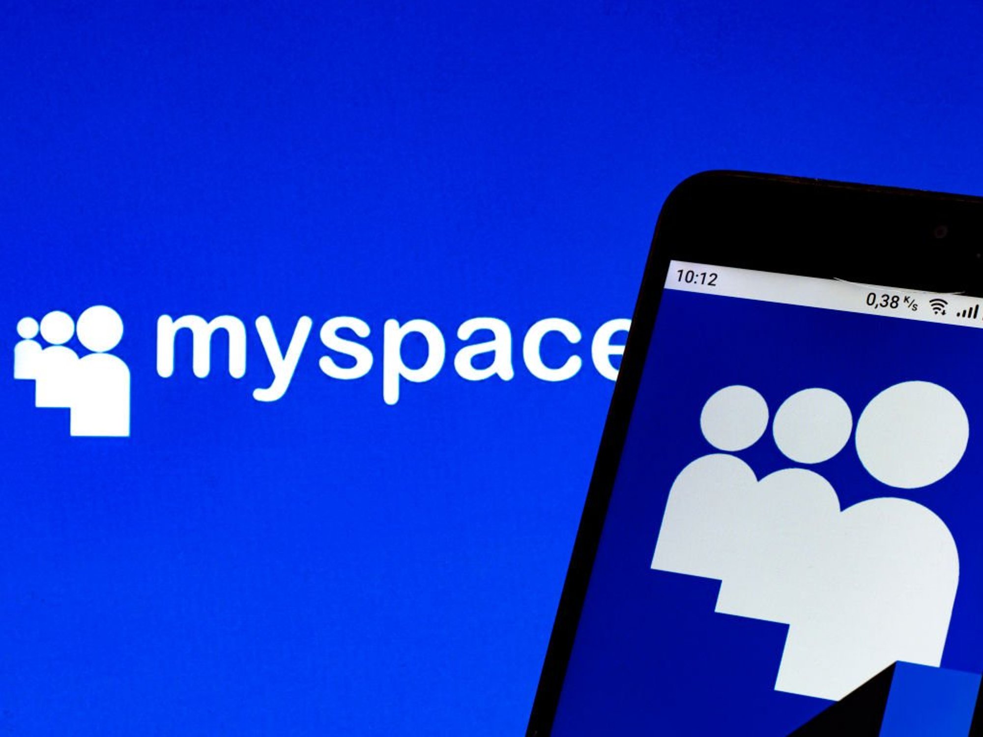 Myspace logo on mobile and in background
